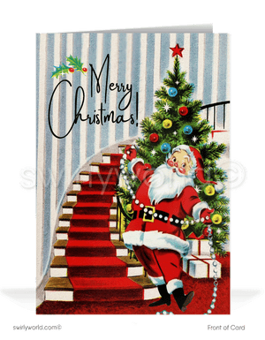 1950s Santa Claus in house foyer in front of vintage Christmas tree printed holiday cards. Mid-century Santa Claus Christmas tree