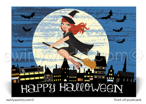 This postcard postcard design features a beguiling witch on her broom flying across a moonlit sky overlooking the cityscape, set against a vivid midnight blue backdrop adorned with fluttering bats.