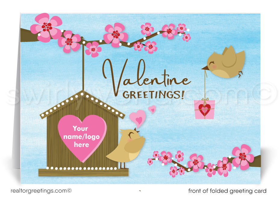 This Valentine's Day greeting card charmingly displays a birdhouse with a pink heart-shaped entrance, where a joyful little bird perches on the branches of a cherry tree, symbolizing the warmth of a home. Another bird approaches, carrying a Valentine's Day gift, adding a playful and joyful element to the scene.