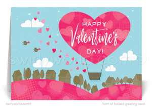 Cute heart-shaped hot air balloon over neighborhood of houses happy Valentine's Day cards for realtors.