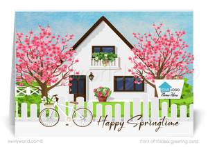 Charming spring card with a white cottage, cherry blossoms, bike & signpost for custom branding. Retro style, sunny blue sky & “Happy Springtime” greeting!